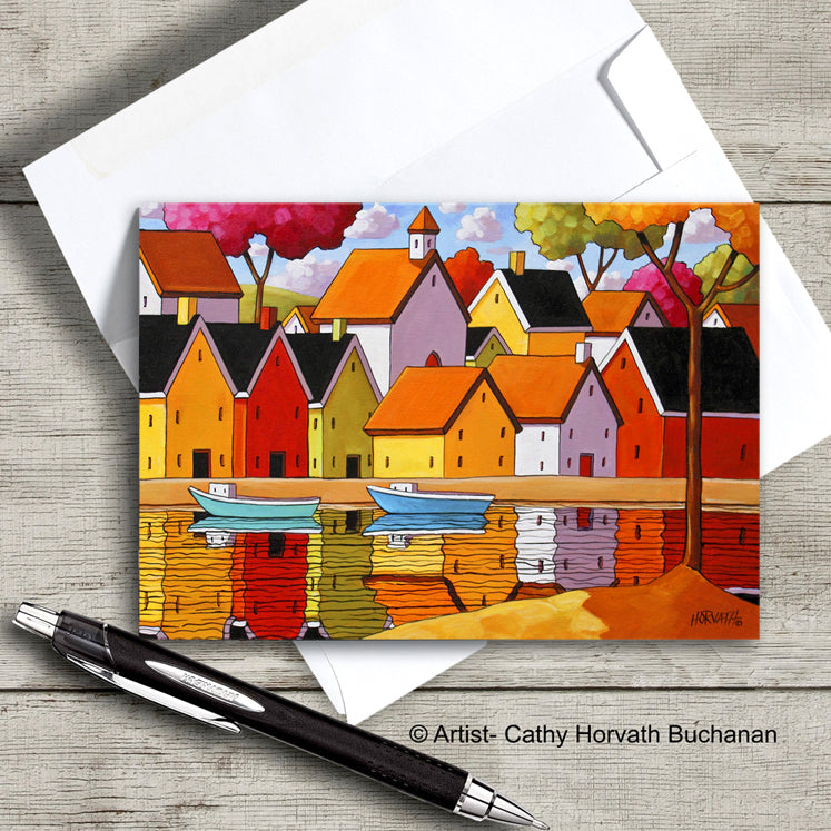 brightly colored waterside landscape village art card with envelope birthday card and envelope of summer dock with lounge chair by artist Cathy Horvath Buchanan